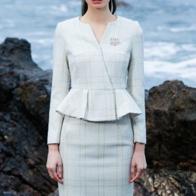 The pleated-peplum plaid tweed skirt suit (UK size 14)